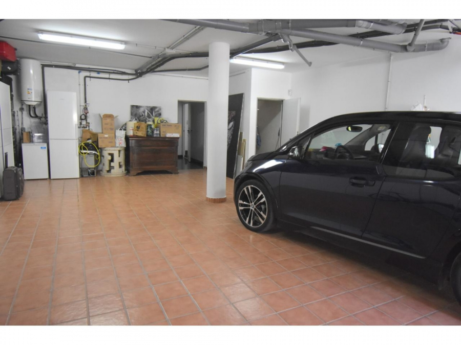 Garage - MALLORCA BROKER – Luxuriöse DHH mit Infintiy-Pool in Alcanada zum Kauf