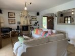 MALLORCA BROKER - Finca mit Pool und Gästehaus in Pollensa zum Kauf - Wohnzimmer