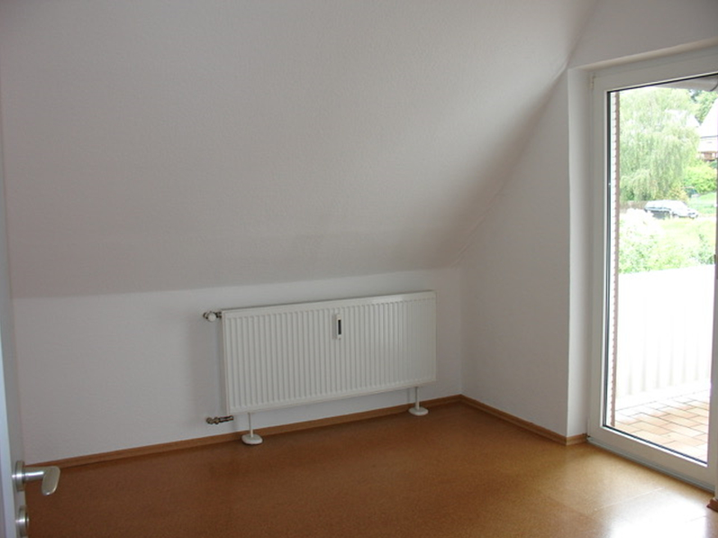 Wohnzimmer DG - KNIPFER IMMOBILIEN – Dreifamilienhaus mit Potenzial in Regensburg zum Kauf!